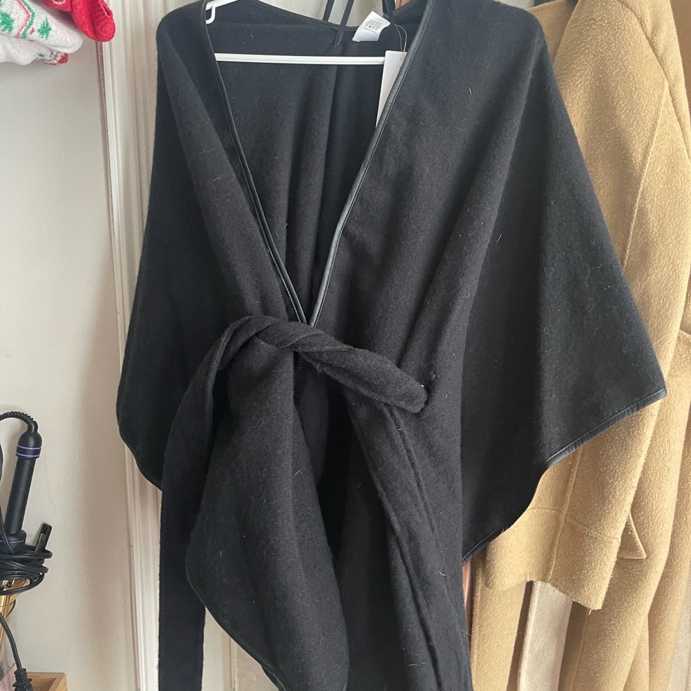 Never worn. Cardigan/wrap sweater